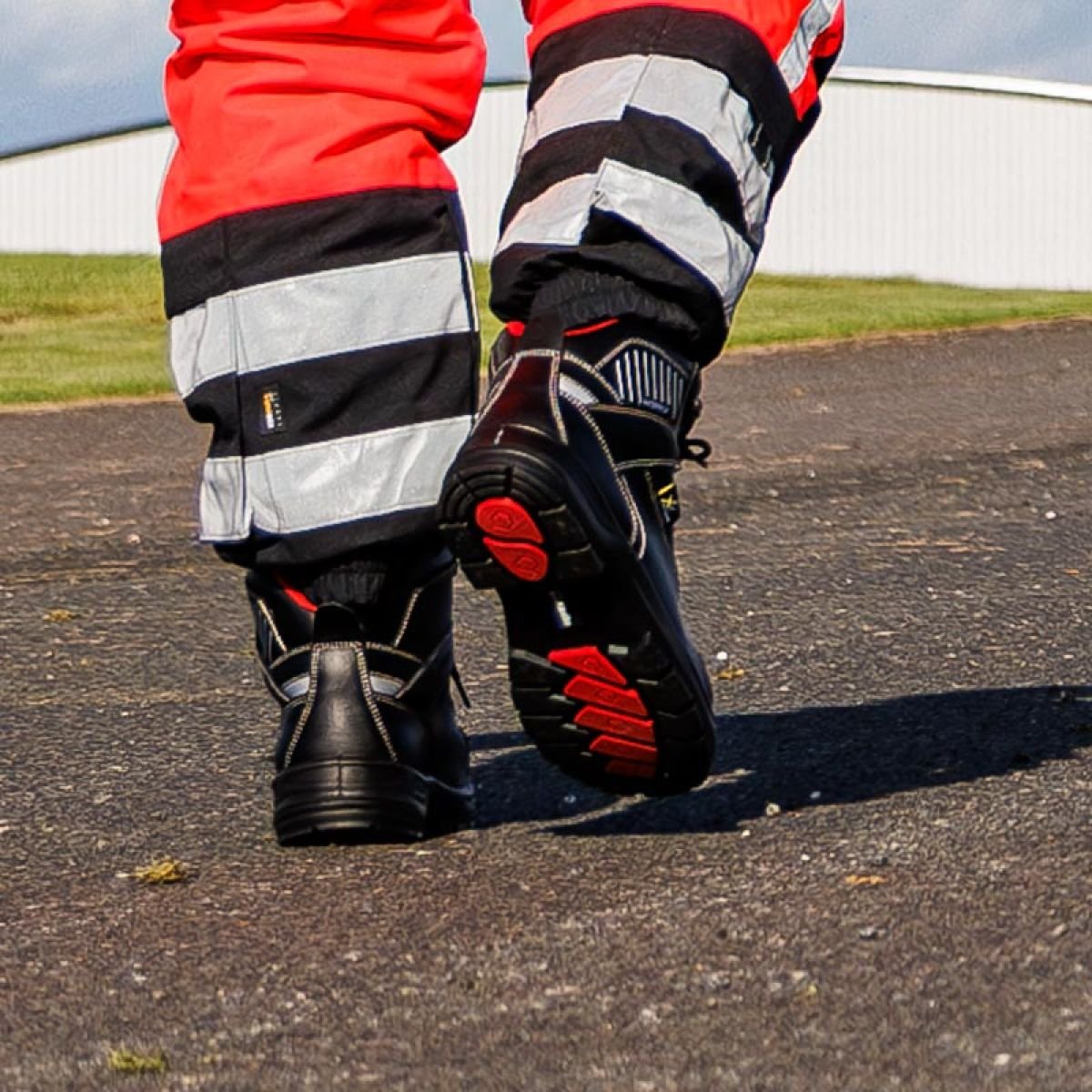 Airfield operator wearing airline boots