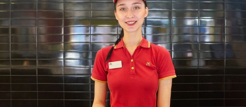 McDonalds Employee in red uniform